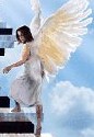 An angel ascending stairs